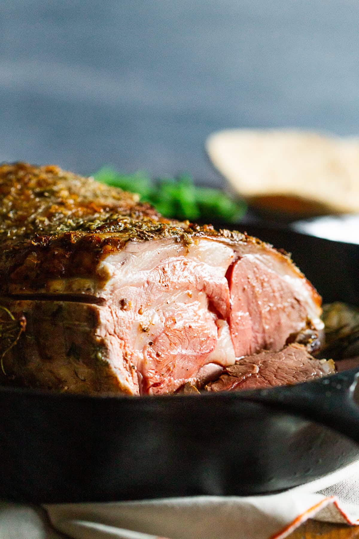 Sliced Garlic Rosemary Roast Leg of Lamb. 