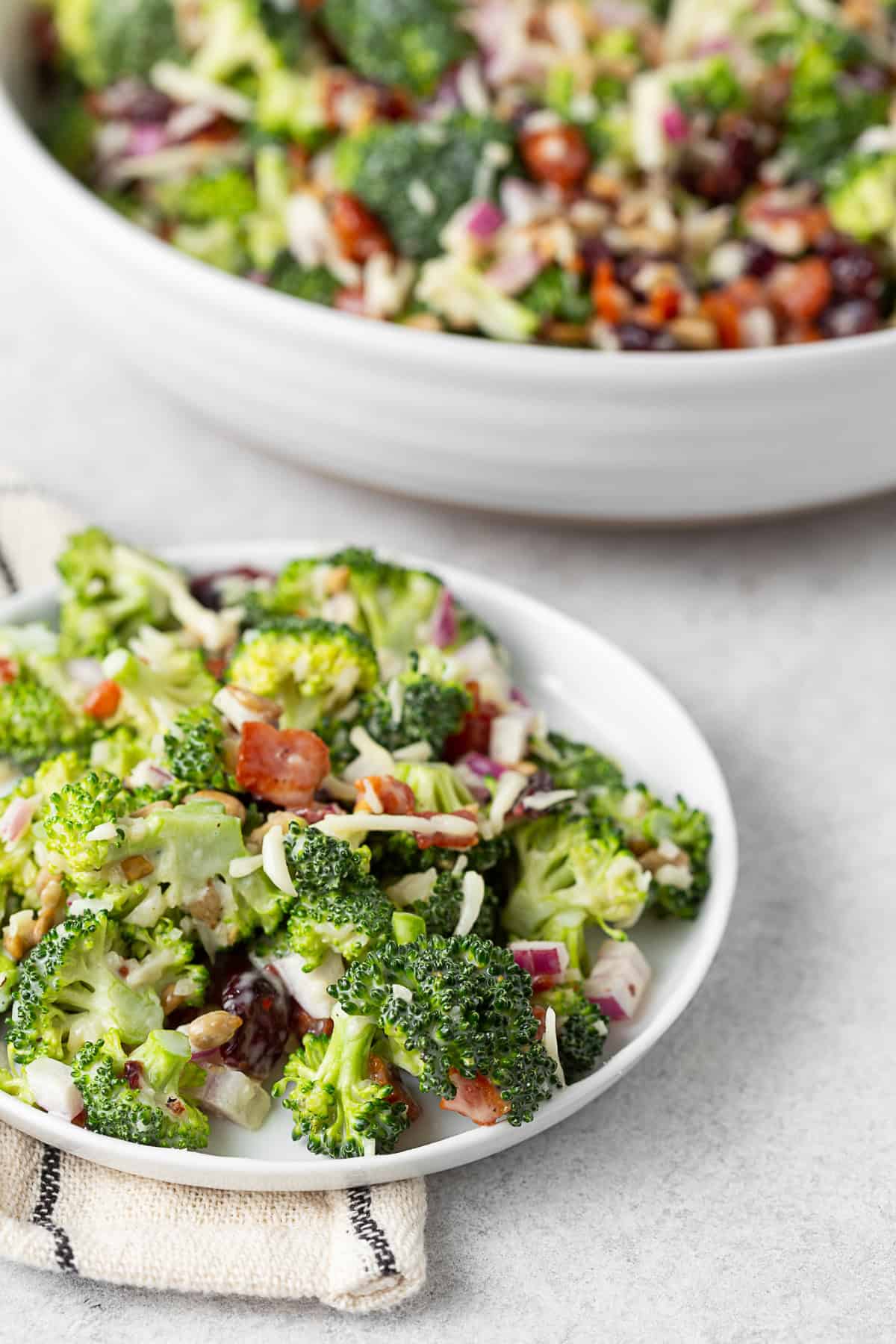 The Best Broccoli Salad spooned on to a plate. 