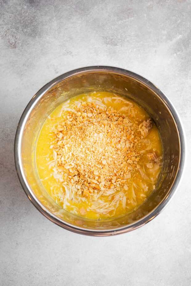Shredded chicken in a pot.