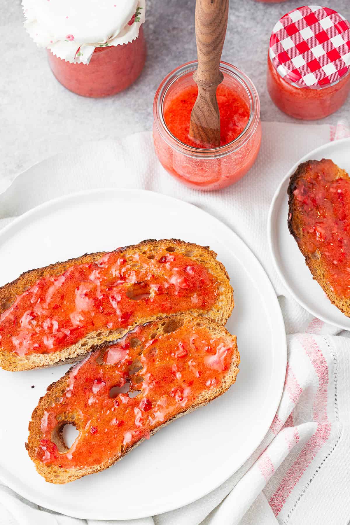 Strawberry Freezer Jam spread on toast. 