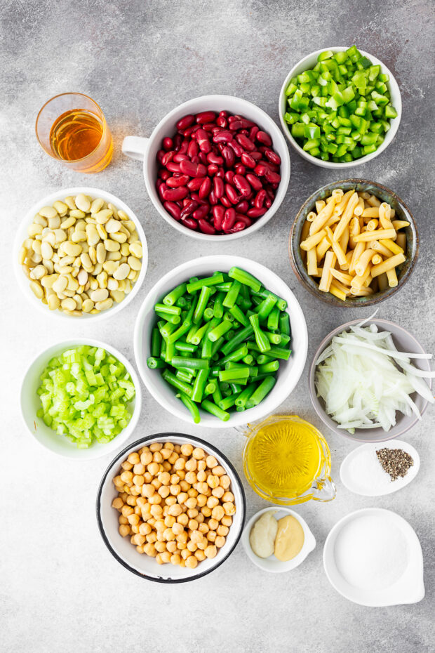 Ingredients for The Best 5 Bean Salad on a table. 