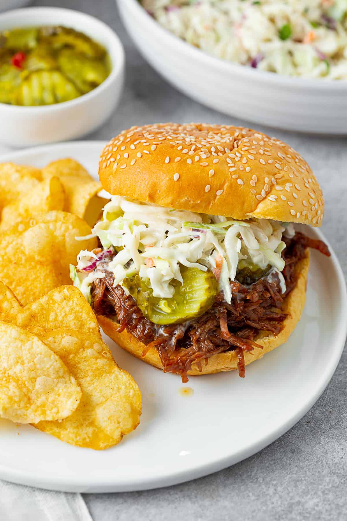 Creamy Coleslaw on top of a shredded beef sandwich.