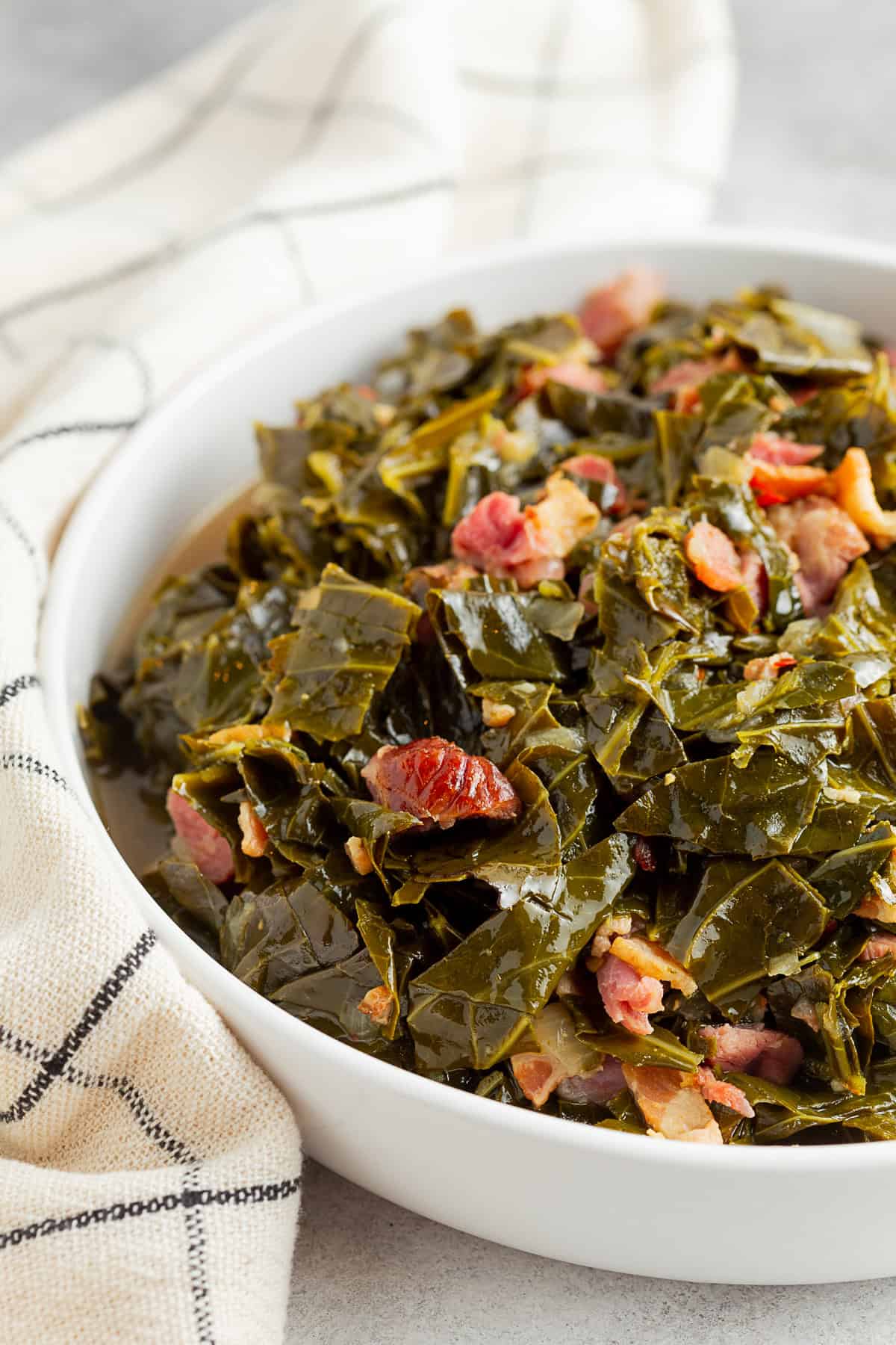 Instant Pot Collard Greens in a large white serving bowl.