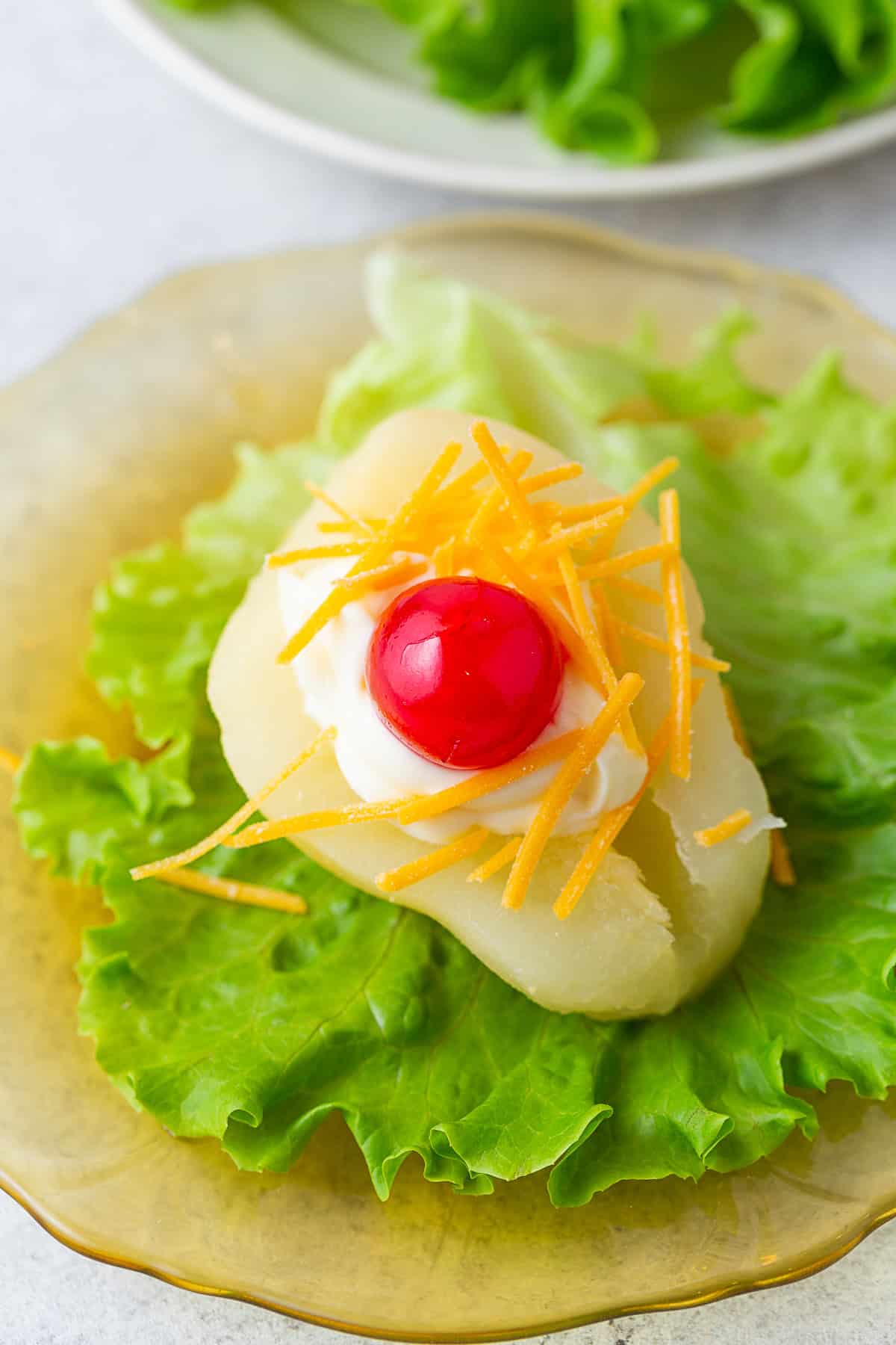 Southern Pear Salad sitting on a little lettuce leaf. 