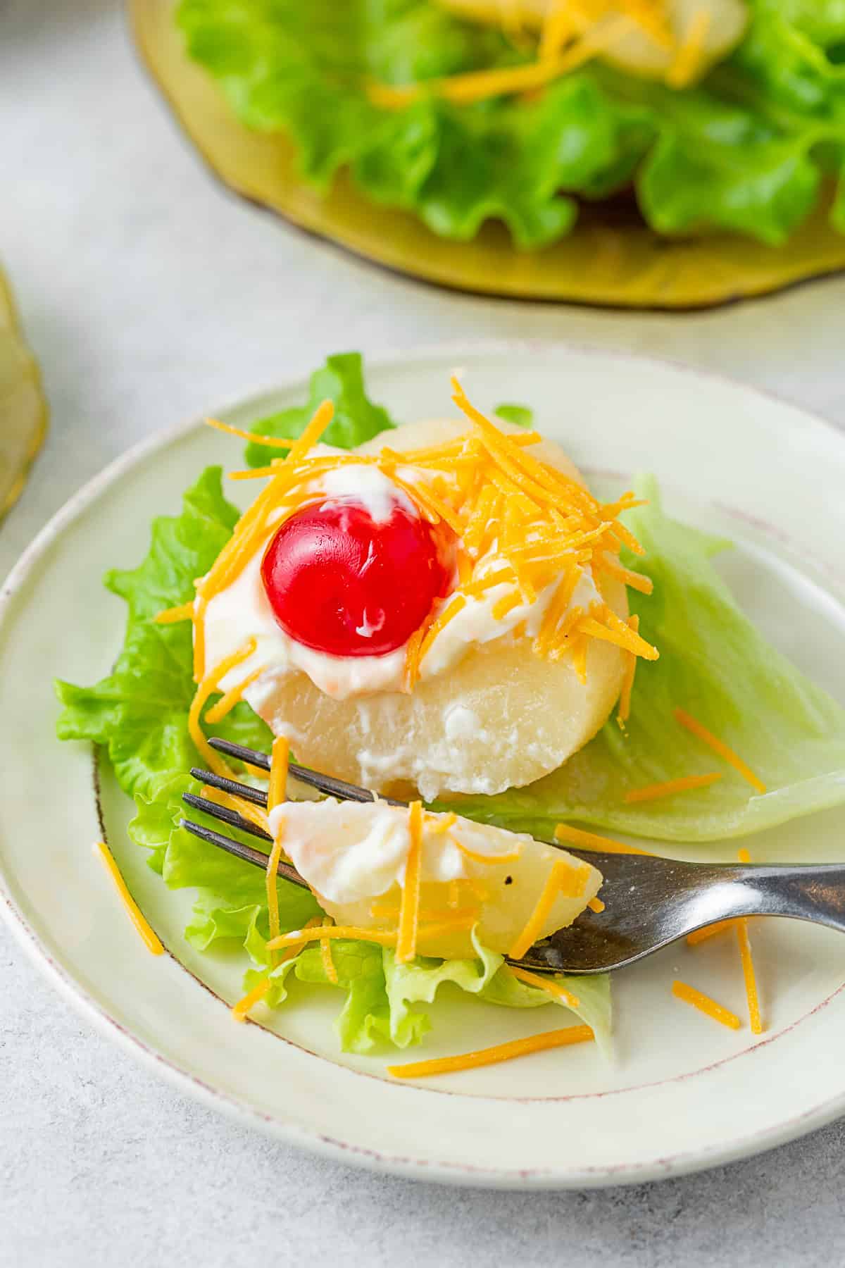 Southern Pear Salad being eaten with a fork. 