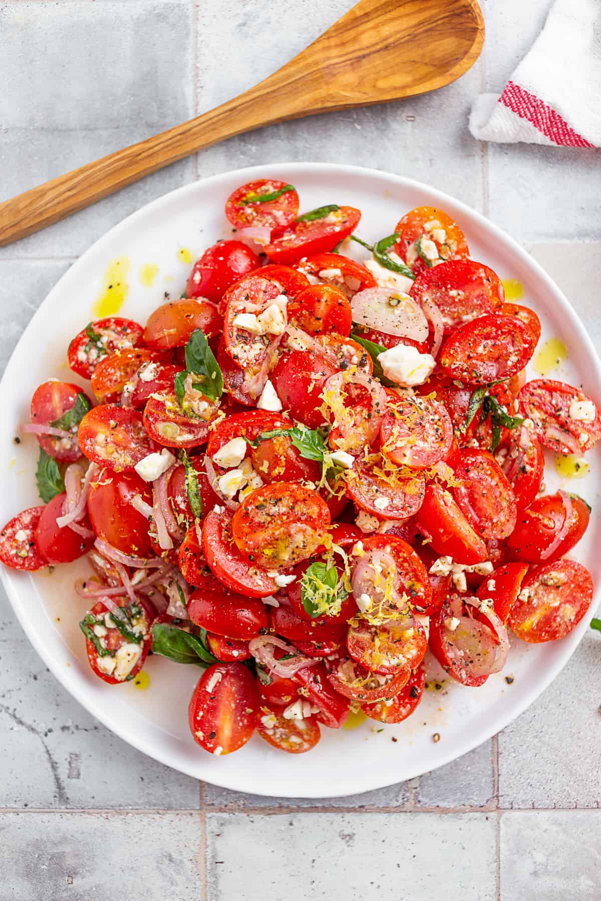 Tomato Feta Salad on a large white serving platter.