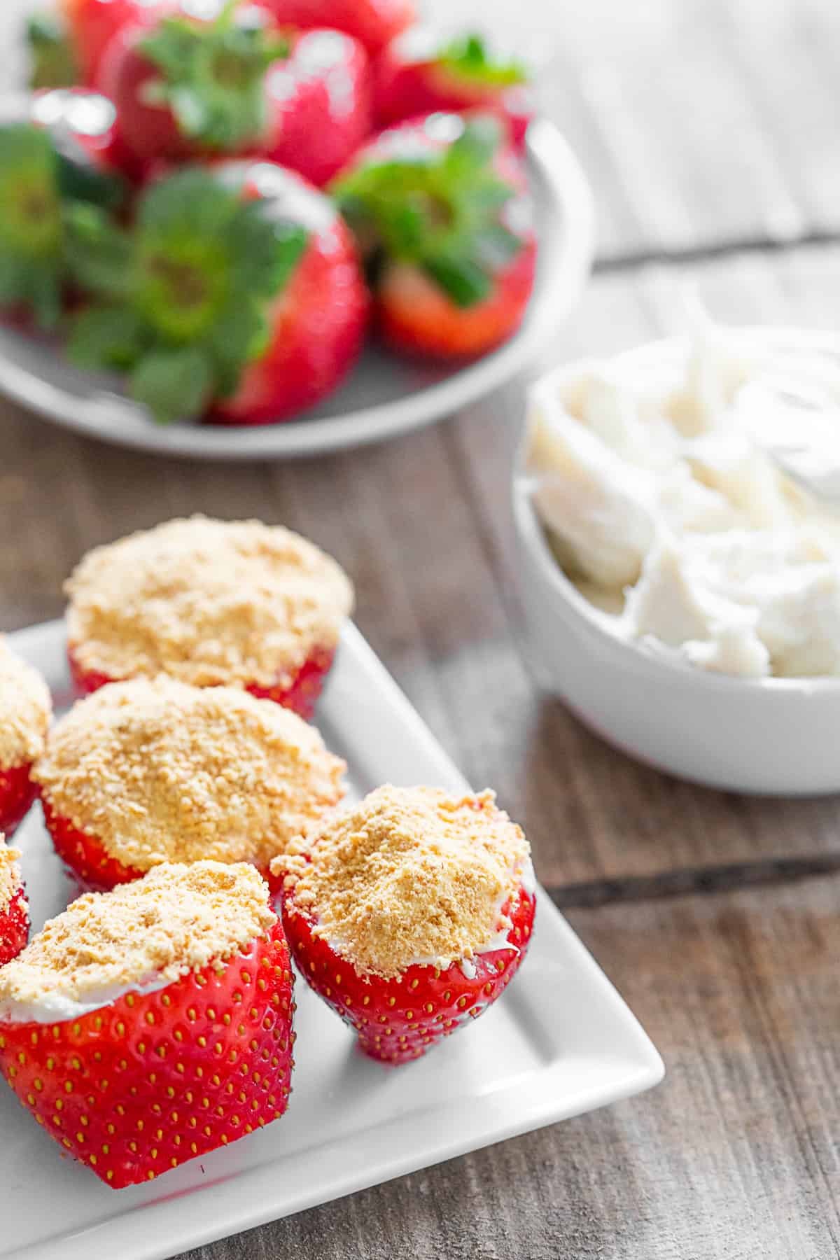 Cheesecake Stuffed Strawberries on a serving platter. 