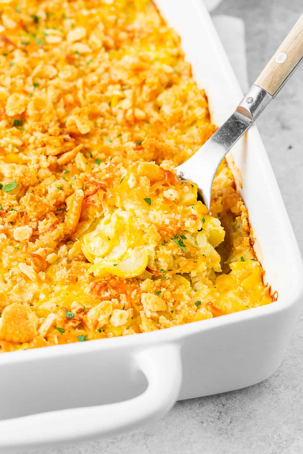 Yellow Squash Casserole topped with Ritz crackers. 