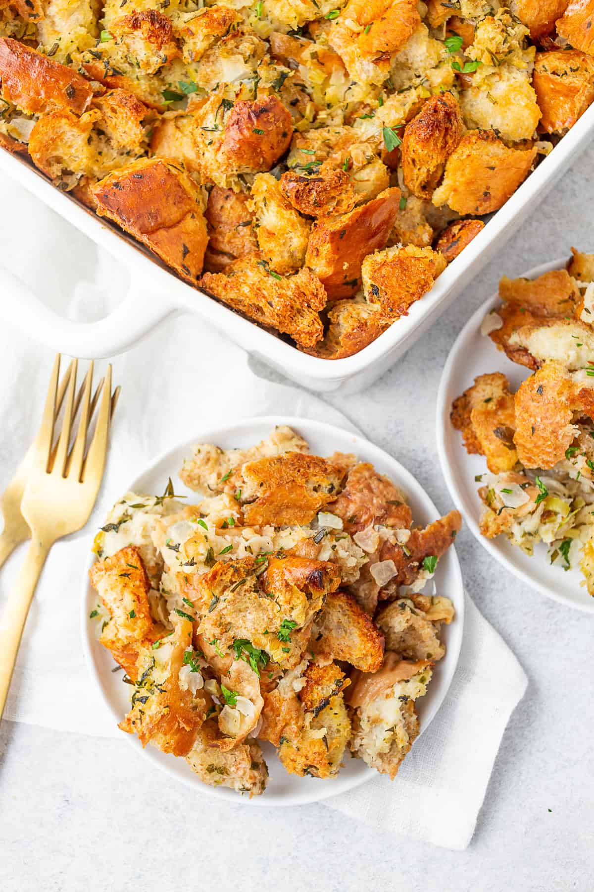 Herb Stuffing spooned onto a plate. 