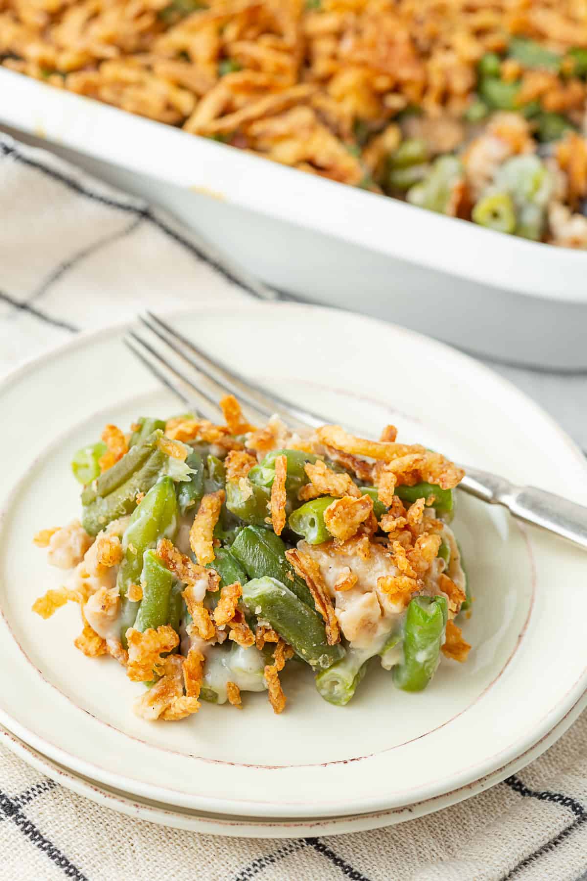 Green Bean Casserole spooned onto a plate.