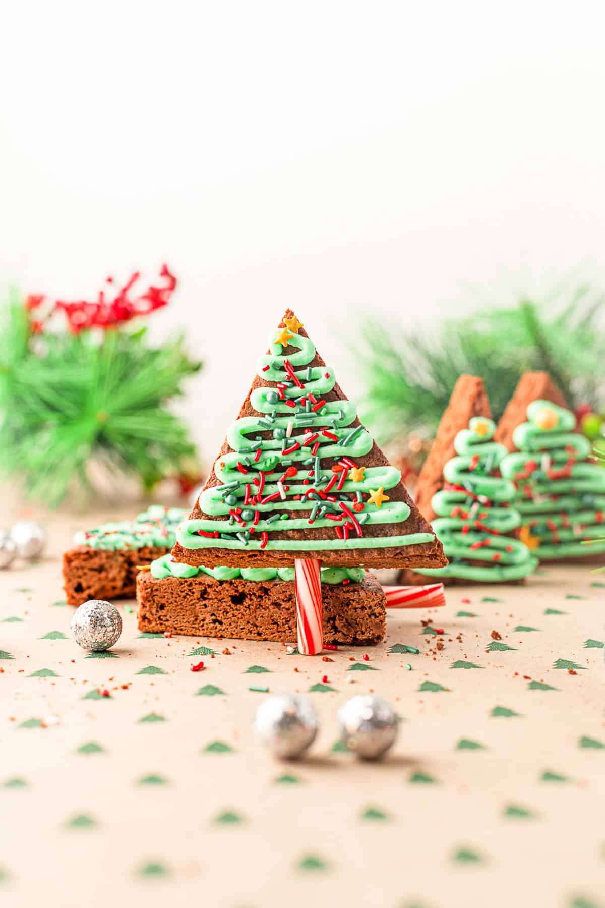 Christmas Tree Brownies with a candy cane trunk. 