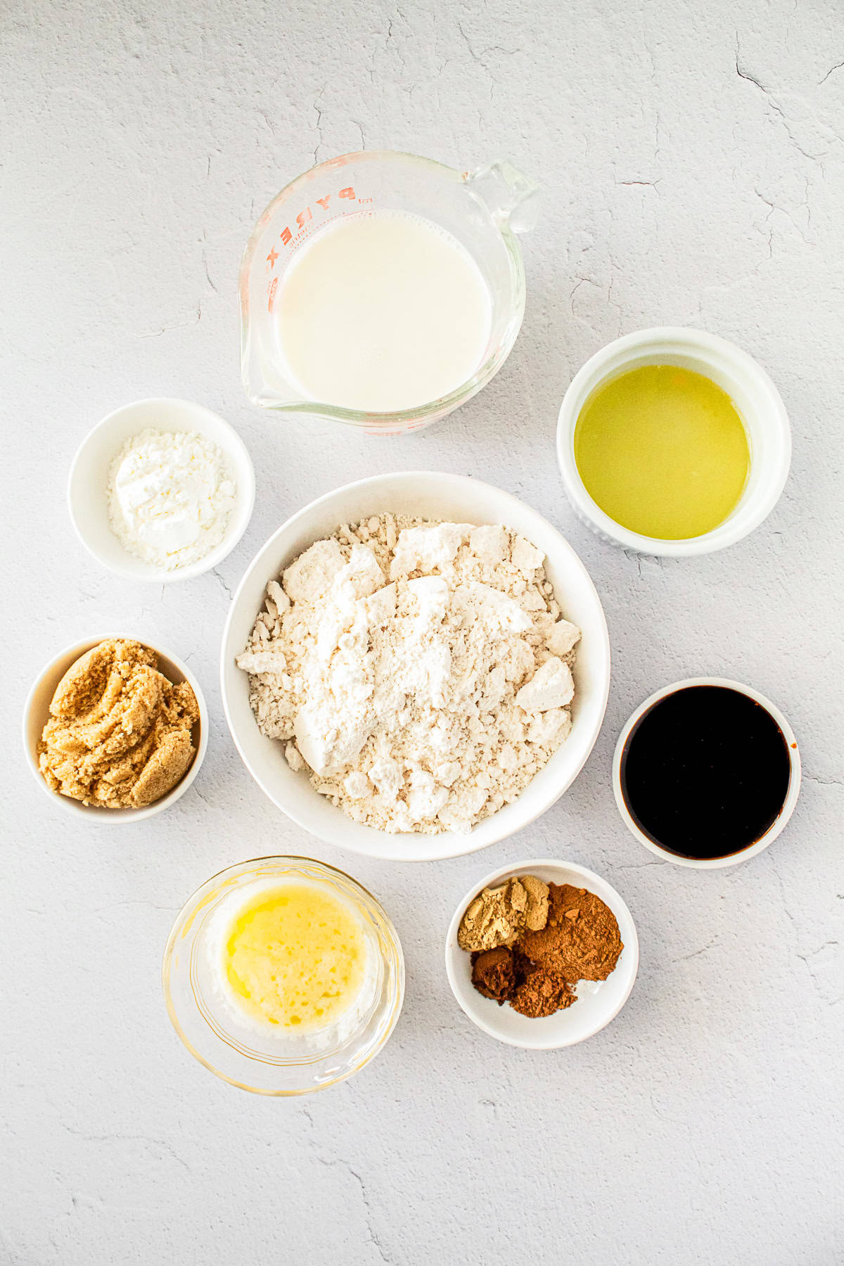 Ingredients to make Gingerbread Waffles on a table. 