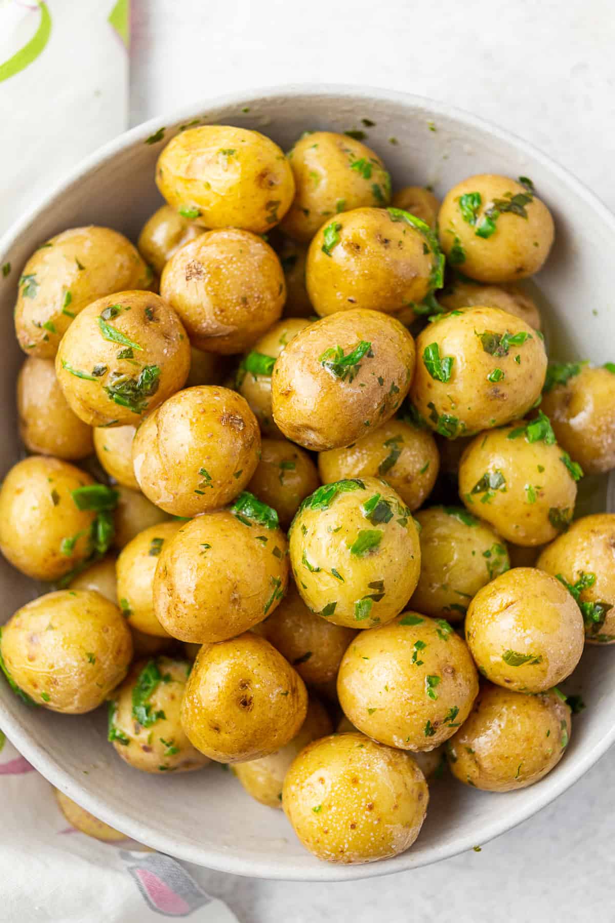 Syracuse Salt Potatoes tossed in fresh herb butter. 