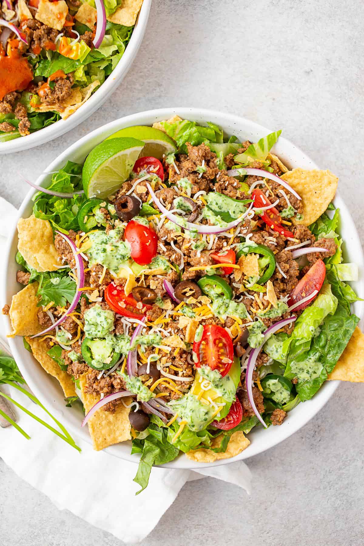 Easy Taco Salad topped with cilantro lime dressing. 