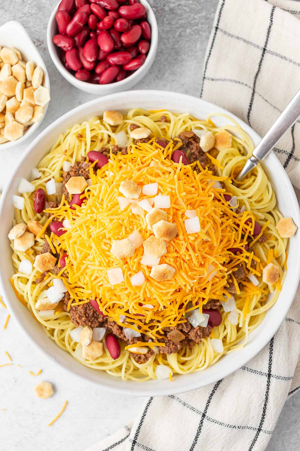 Cincinnati Chili on a plate topped with 